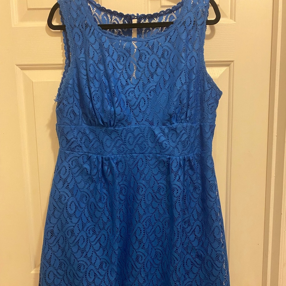 Lovely blue lace dress. Sleeveless and knee length. Fully lined. Hardly worn.